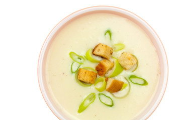 Leek and Potato soup with croutons. Selective focus.
