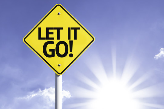 Let It Go Road Sign With Sun Background