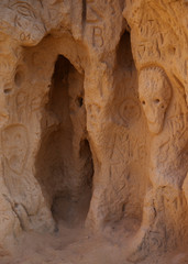 Different Face Art on Cave Walls