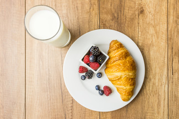 Healthy Breakfast With Croissant, Milk And Fresh Fruits