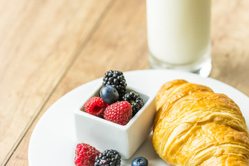 Healthy Breakfast With Croissant, Milk And Fresh Fruits
