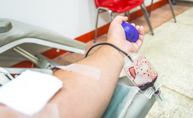 Close up of a patient transfused blood in hospital