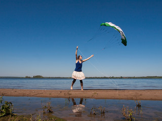 Young woman helds kite © ukromka