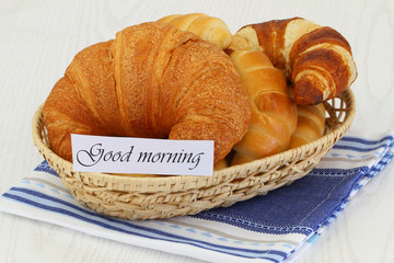 Good morning card with butter croissants in bread basket