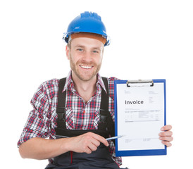 Handyman Showing Invoice On Clipboard
