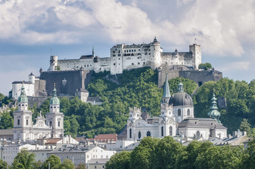 Fototapeta na wymiar Salzburg Fortress (Festung Hohensalzburg) seen from Salzach rive
