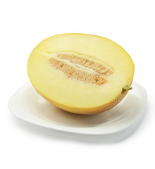 Half of cantaloupe melon on plate