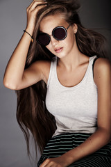 Naklejka premium Portrait of young girl in studio