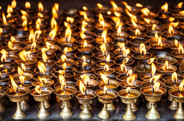 Butter lamps with flames