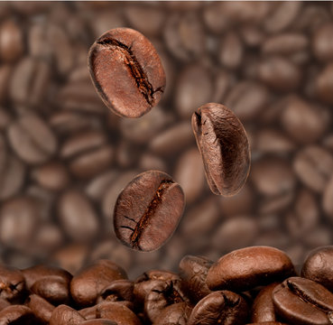 Closeup of coffee beans with focus on one