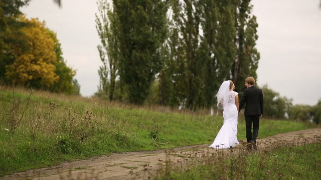 Wedding Couple Walking Away