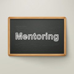 mentoring on blackboard in wooden frame