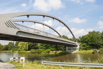 Fototapeta na wymiar Bridge over the channel during summer