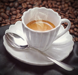 Vintage coffee in a white cup