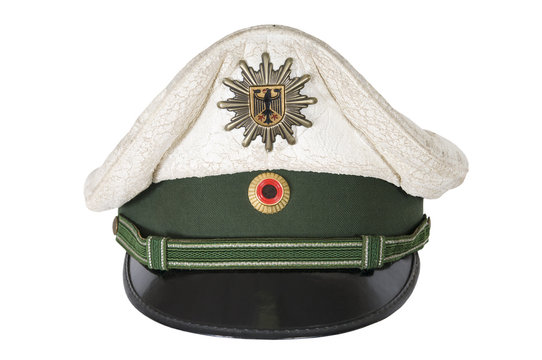 Police hat, against of the German 