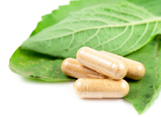 Pills on green sheet