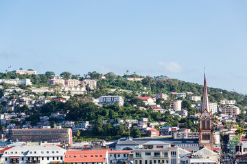 Fototapeta na wymiar Church Steeple and Buildings in Martinique