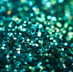 Holiday shiny blurry turquoise background. Macro