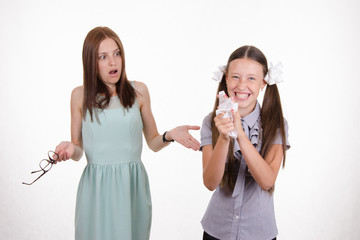 Trainee crumples sheet torn from a notebook