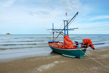 Naklejka na ściany i meble Fisherman boat on the beach, Huahin, Thailand