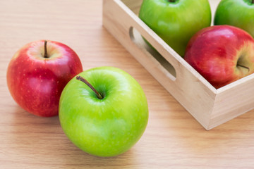 Green apple and red apple