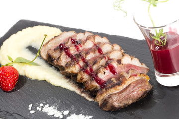 baked goose breast with mashed potatoes and apple sauce