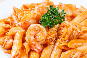 Stir fried macaroni and prawn with tomato sauce