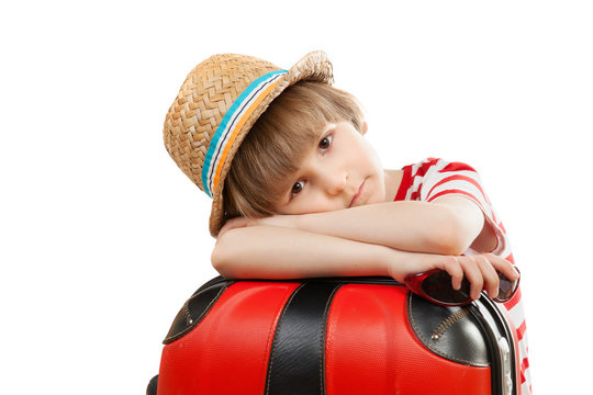The tired child with red suitcase