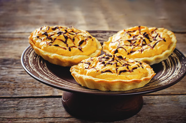 tartlets with pumpkin cream for Halloween for kids