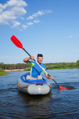 Young man kayaking
