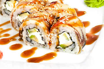 roll with eel on a plate