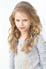 Naklejka premium portrait of a beautiful fashion little girl