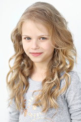 Naklejka premium portrait of a beautiful fashion little girl