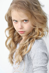 Naklejka premium portrait of a beautiful fashion little girl