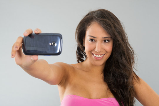 Black woman taking selfie