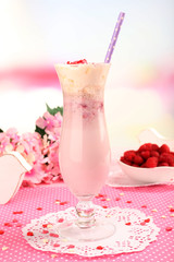 Delicious milkshake on table
