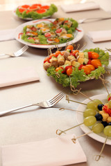 Restaurant table setting with tasty food