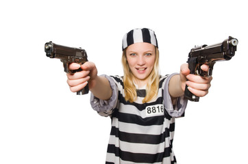 Prison inmate with gun isolated on white