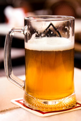 glasses with light and dark beer in a cafe