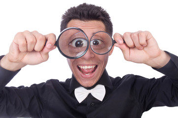 Funny man with magnifying glass