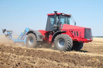 Obraz premium tractor with a plow
