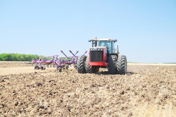 Obraz premium tractor with a plow