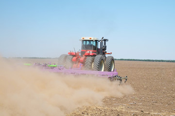 tractor with a plow