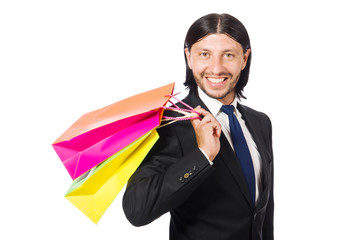 Man with shopping bags isolated on white