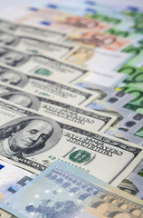 World Currency Concept: Closeup of European and the US Hard Curr