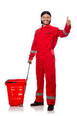 Man in red coveralls with shopping supermarket cart trolley