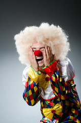 Funny clown in the studio