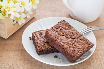 Brownies on plate and coffee cup