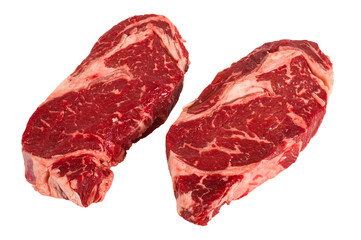 Ribeye steaks isolated on white background