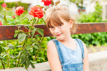 Summer portrait of a cute little girl